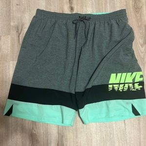 Men’s Nike swim shorts. Never worn. Size L and Tall